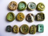 13 Artisan clay Buttons Patina handmade burnished carved clay shabby chic aqua green turquoise copper. $26.00, via Etsy.... 