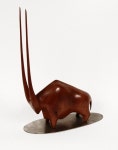 A hand carved wood bison with oval metal base by Hagenauer. | 목각, 목공예, 공예