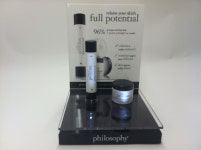 An cosmetic acrylic display with replaceable header and LED lighting focused on the products. | 디스플레이, 화장품