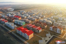 사회주의농촌문명의 본보기로 일떠선 련포온실 농장마을에 새집들이경사가 났다 | Basketball court, Court, Sports