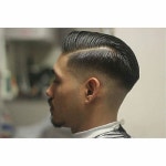 Gentlemens #sidepart done proper and earning todays #goodlookoftheday by @hairea. Well blended #midtaper and combed over into an... 