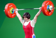 제31차 올림픽경기대회에서 우리 나라의 림정심, 리세광선수들 금메달 쟁취