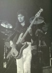 John Deacon live on stage on the UK A Night At The Opera tour in November/December 1975. | 조각