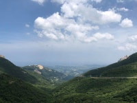 View from the top of the Misiryeong Ridge, the valley and Sokcho and the East Sea in the background. #Misiryeong #MisiryeongRidge... 