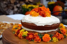 Pumpkin spice cake decorated with marigolds | Elegant birthday cakes, Pumpkin spice cake, Cake