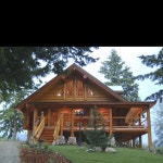 Log home with wrap around porch. Like the offset steps and door. | 집