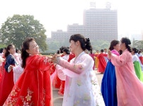 조선민주주의인민공화국창건 69돐경축 녀맹일군들과 녀맹원들의 무도회 진행