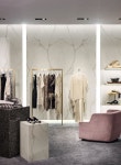 muted gray Calacatta Natura, the wall and display stand provide a much-needed touch of luxe … | 옷 가게 인테리어, 인테리어