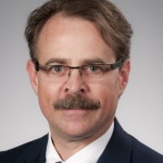 케이앨 | John NEWCOMER | President and CEO | Research profile