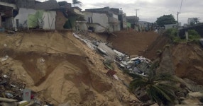 VIDEO: Spectacular sinkhole swallows up homes close to World Cup stadium - Daily Star VIDEO: Spectacular sinkhole swallows up... 