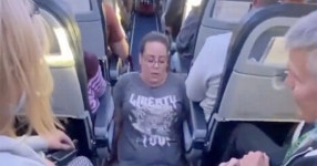 Disabled woman 'told to wear nappy' as no aisle seat on board so drags herself to loo - Daily Star Disabled woman 'told to wear...