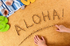 Aloha written in sand   Photo | Free Download
