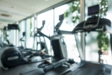 Cardio machines in a gym blurry  Photo | Free Download