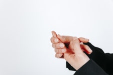 Crop female hands with pain in finger  Photo | Free Download
