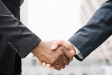 Crop men in suits shaking hands  Photo | Free Download