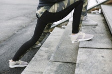 Crop women lunging on stairs  Photo | Free Download