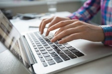 Cropped View of Hands Typing on Laptop  Photo | Free Download