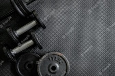 Exercise weights - iron dumbbell with extra plates  Photo | Free Download