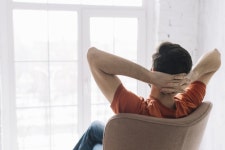 Faceless man relaxing in armchair  Photo | Free Download