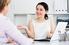 Female manager with client  Photo | Free Download
