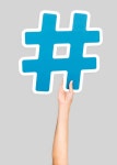 Hand holding hashtag symbol  Photo | Free Download