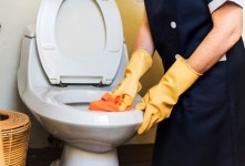 Housekeeper cleaning a hotel room  Photo | Free Download