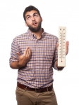Man with warmth and a thermometer  Photo | Free Download