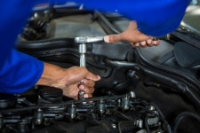 Mechanic servicing a car  Photo | Free Download