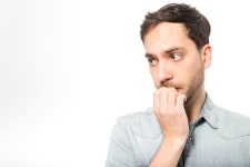 Nervous man biting nails  Photo | Free Download