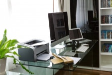 Office with a computer and a glass table  Photo | Free Download