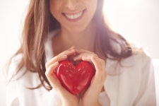 Red heart in the hands of a woman  Photo | Free Download
