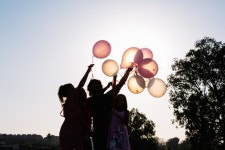 Silhouette of family holding balloons  Photo | Free Download
