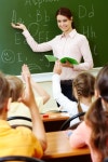 Teacher teaching the alphabet  Photo | Free Download