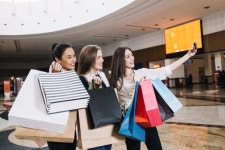 Women taking selfie in mall  Photo | Free Download
