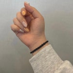 나쁜 기운을 막아주는 오닉스 매듭팔찌 | 아이디어스 나쁜 기운을 막아주는 오닉스 매듭팔찌