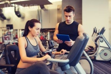 유토이미지 | sport, fitness, lifestyle, technology and people concept - woman and trainer with tablet pc computer working out... 