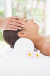 유토이미지 | Beautiful brunette enjoying a head massage