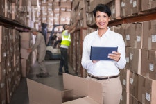 유토이미지 | Pretty warehouse manager using tablet pc