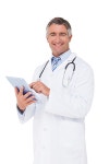 Happy doctor using tablet pc on white background | 유토이미지 | 상세페이지 | 베이직샵 | 사진 | 19510693