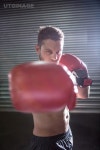 유토이미지 | Portrait of serious muscular boxer in crossfit gym