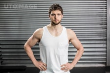 유토이미지 | Man with hands on hips at crossfit gym