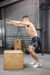 Shirtless man jumping on wooden block at the crossfit gym | 유토이미지 | 상세페이지 | 베이직샵 | 사진 | 20012671