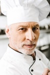 portrait of handsome male chef in uniform and cap in restaurant... male chef in uniform and cap  in restaurant kitchen | 유토이미지... 