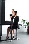 유토이미지 | side view of hairstylist doing hairstyle for businesswoman in suit