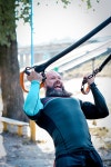 유토이미지 | Active man with beard during workout in outdoors gym