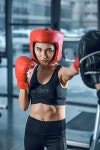 equiped sporty female boxer training at gym | 유토이미지 | 상세페이지 | 베이직샵 | 사진 | 21140996