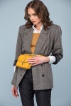 유토이미지 | beautiful serious fashionable woman in formal wear posing isolated on grey
