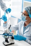 selective focus of biologist looking at test tube in lab | 유토이미지 | 상세페이지 | 베이직샵 | 21269667