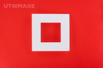 유토이미지 | white frame isolated on red with copy space
