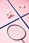 유토이미지 | Badminton shuttlecocks with shadow on pink surface with blue lines